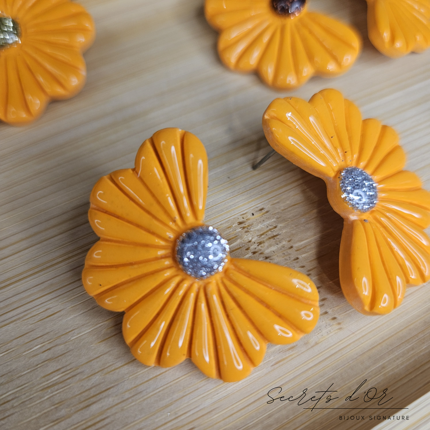 Puces Laurène - orange brillant