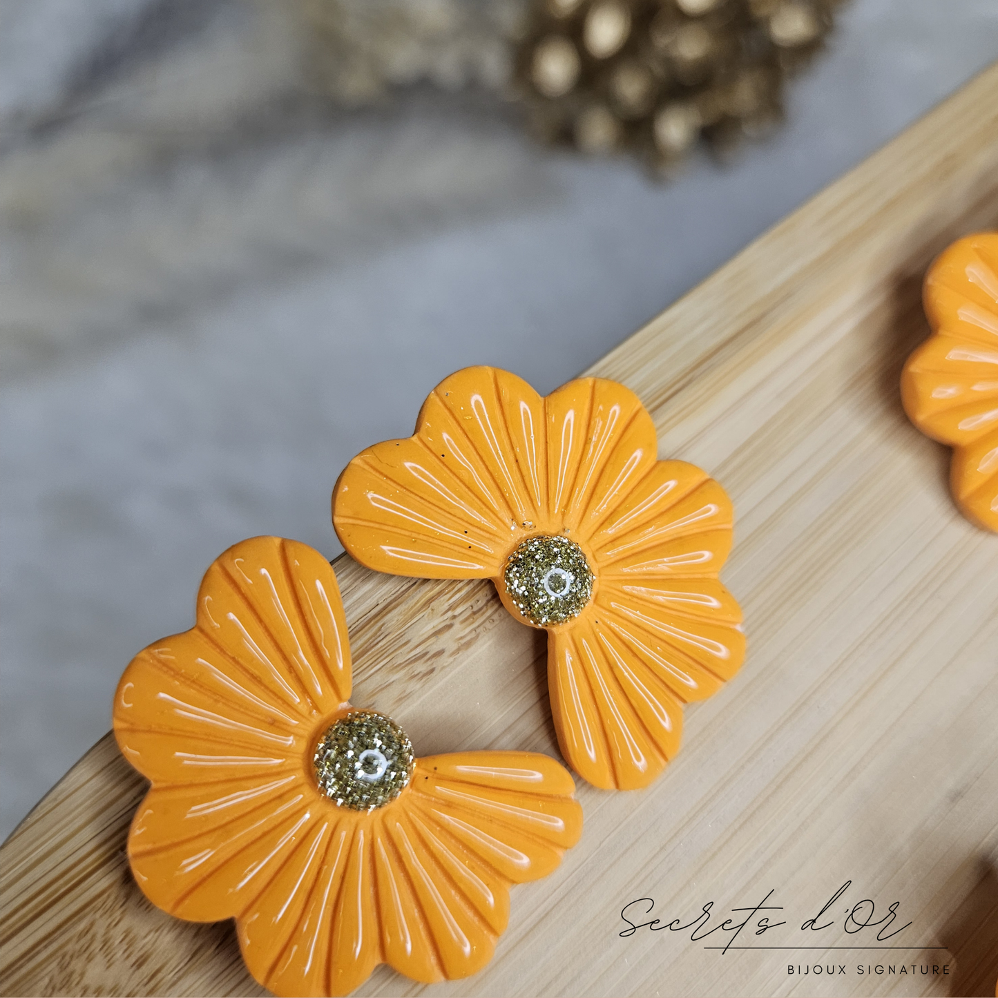 Puces Laurène - orange brillant