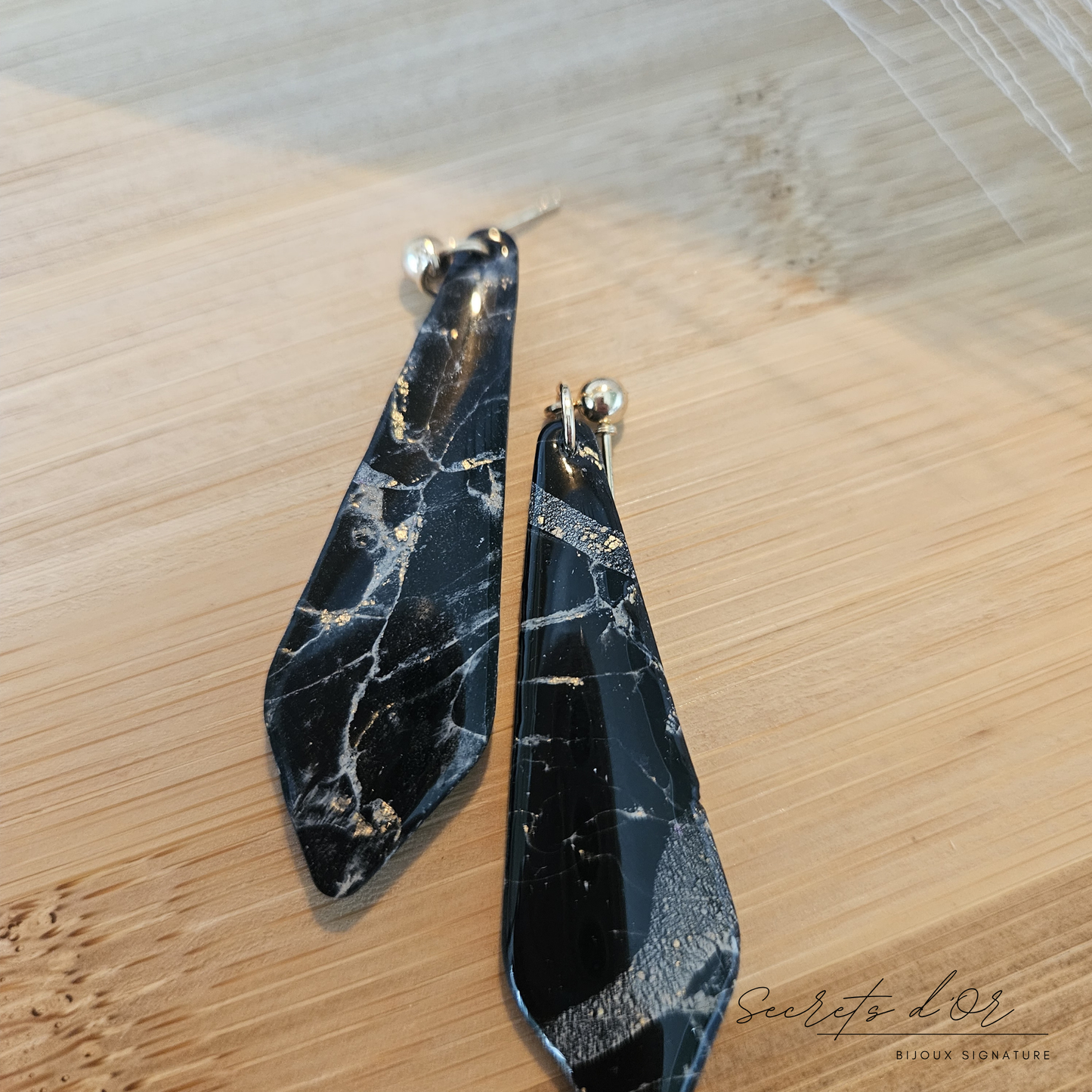 Boucle Marbre Noir - losange allongé