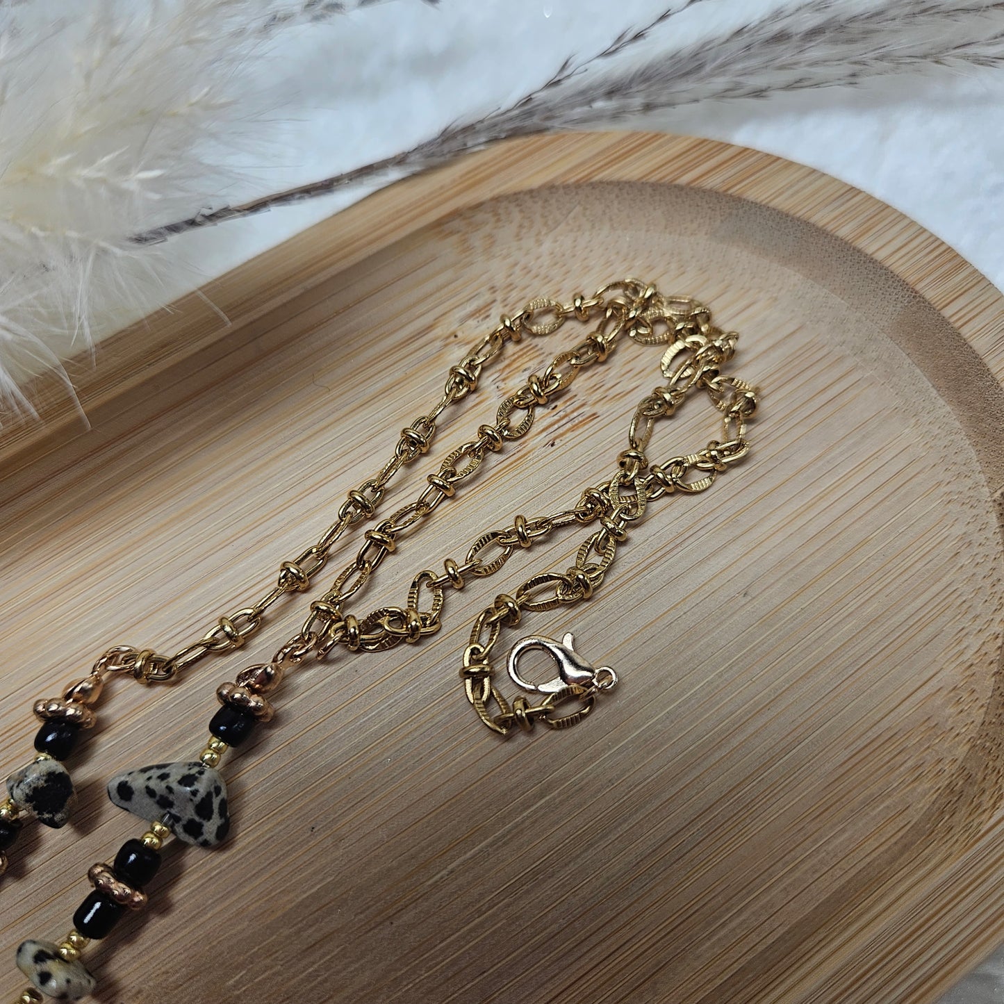 Collier noir/blanc/feuille